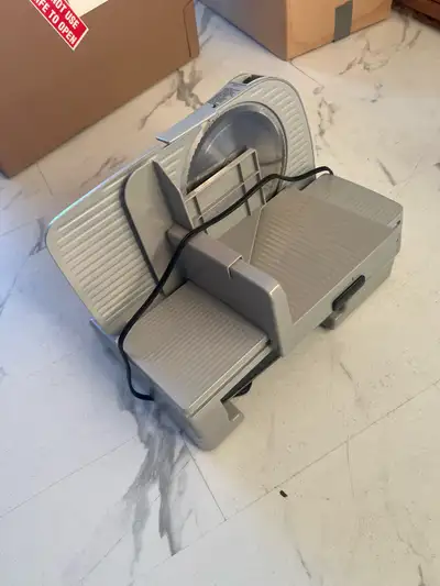 I'm selling this EdgeCraft meat slicer, perfect for slicing meats, cheeses, and more with precision!...