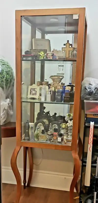 2 Curio Cabinets, View more