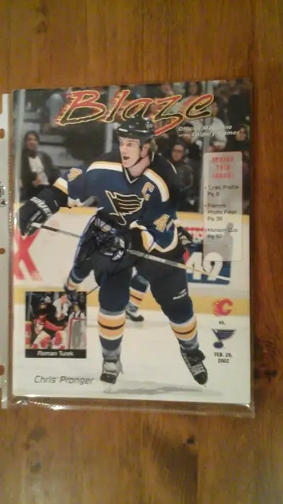 2002 Calgary Flames Blaze program autographed by Chris Pronger of the St Louis Blues. $25 obo. Pleas...