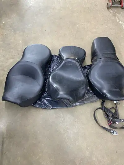 Have 2 Harley take off seats, 1 from a Road King, 1 from a Heritage Softail, and a Sundowner seat fo...