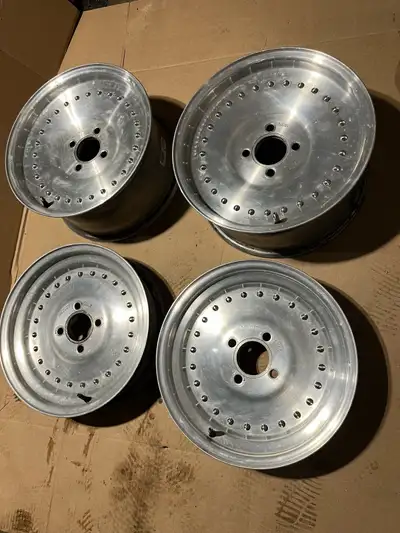 Classic centre line rims genuine 2 piece. Fits fox body Mustang. Good condition. No centre caps. Mak...