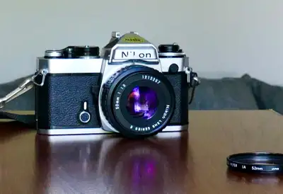 Manual focus F-mount 35mm SLR released by Nikon in 1978. It was a replacement for the Nikon EL2 and...