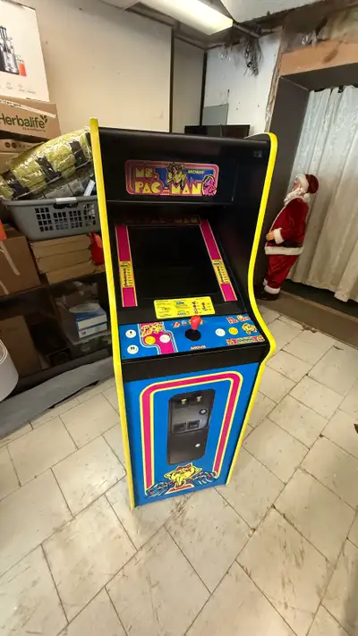 Step right up and relive the glory days with this Midway Ms. Pac-Man arcade game, loaded with over 5...