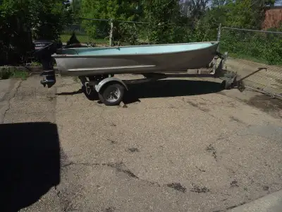 I am selling my 14 foot Naden with an excellent running 1994 9.9 horse Evinrude and a galvanized EZ...