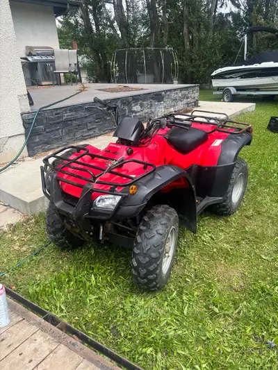 2005 Honda 400 runs good new shock in back please text me not press (still available please) if it’s...
