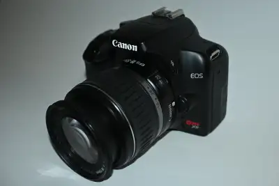 This Canon EOS Rebel XS DSLR digital camera is in EXCELLENT CONDITION. This camera has been tested a...
