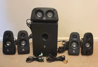 Like New Logitech Z506 Surround Sound Home Theatre 6 Speaker System. Multiple inputs make it easy to...