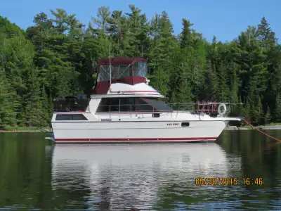 Classic Canadian built motor yacht located on beautiful Lake of the Woods, Kenora, Ontario is offere...
