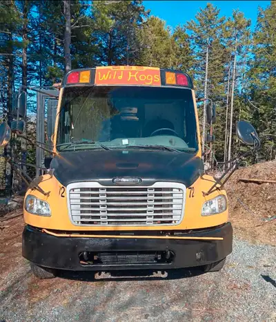 I have a school bus tiny home for sale - couch, microwave, bedroom, bed, tv, counter top, pantry clo...