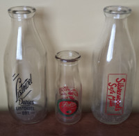 Vintage milk bottles. Listowel, Silverwood's, & Palm Dairies