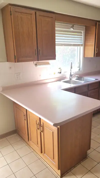 Kitchen Cabinets (used) Wooden (oak) doors Good Condition Included - Counter Top, Sink, Faucet NOT I...