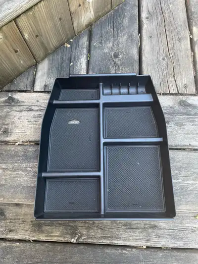 Center console organizer tray removed from a 2018 Ford F-150. Fits the full center console found in...
