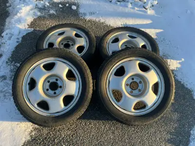 Four 17" lug centric steel rims. 5x114.3mm bolt pattern and 64.1mm hub bore. The tires are no good.