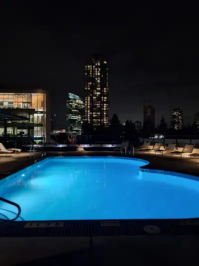 Experience elevated living in this newly built top floor condo featuring floor-to-ceiling windows an...