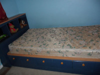 single size storage bed with night table