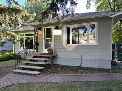 Available August 1, 2025. Cozy, well kept bungalow on huge lot (49' X 143') in sought after Parkalle...