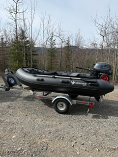 10' 5" boat has aluminum floor, custom gear bags, detachable bimini, and custom cover. See strykerbo...