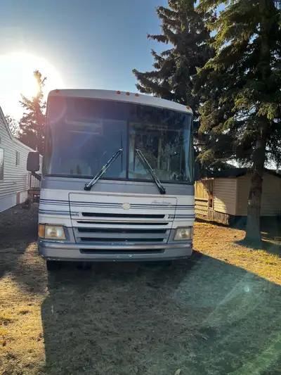 1999 Fleetwood motorhome 36 feet long with only 46,000 kms with two pop outs one in kitchen one in b...