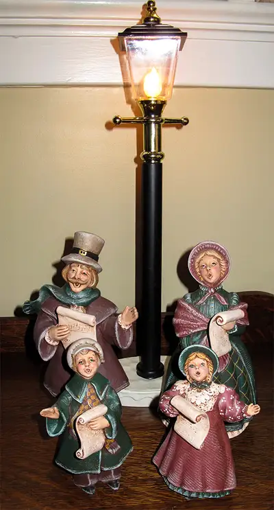 Light up your Christmas with these hand painted ceramic Victorian Carolers with the vintage style el...