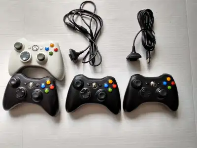 XBOX 360 ASSORTED CONTROLLERS CORDS AND POWER PACKS, View more
