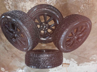 235/65R17 Cooper Evolution winter tires and rims