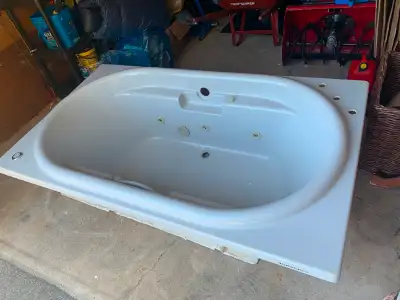 Fibreglass Bathtub with six jets. 72" long x 42" wide x 22" high. Will come with everything you need...