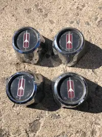 Oldsmobile rally wheel Center caps.