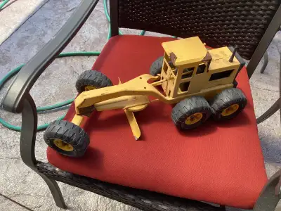 Tonka road grader and bulldozer from the 1970’s, $30 each Good shape , but needs a little paint