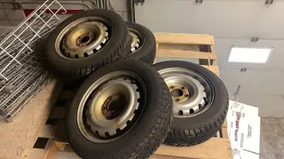 Winter tires - great condition, used one season Rims included 185/60 R15 84T