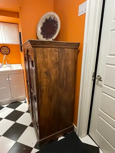 Teak Armoire in very good condition, View more