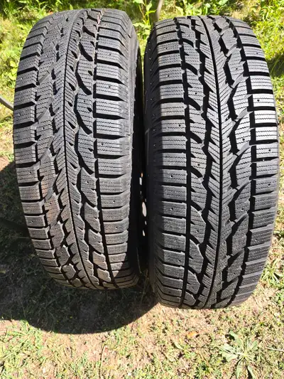LIKE NEW- 2 TIRES FIRESTONE ' WINTER FORCE - 2 UV . DOT - 1323 . BOLT PATTERN 5X114.3 OR 5X4.5 "