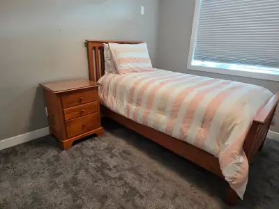 Selling bed and night table, night table includes glass top., View more