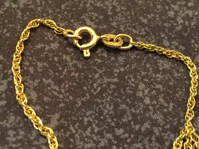 Yellow gold chain 10K.. 23.5 inches. 3.4 grams.., View more