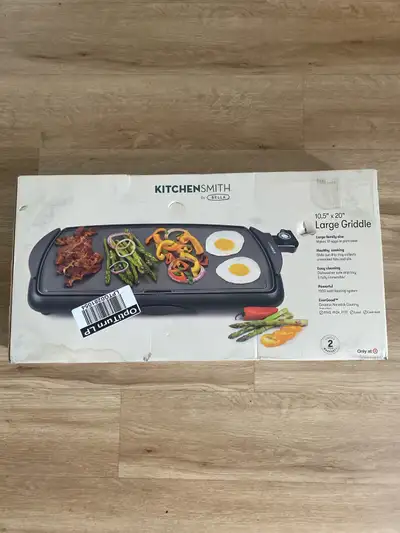 This KitchenSmith by Bella 10.5" x 20" Large Griddle is in brand new, unused condition, still perfec...