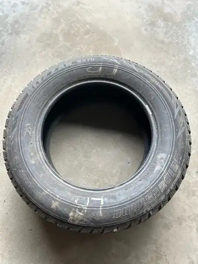 2 tires. Decent condition. Bridgestone Blizzak WS70 235/65R17 104T