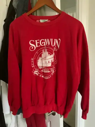 This sweatshirt is of the R.M.S. Segwun in Muskoka pictured on the front with words fun, romance and...