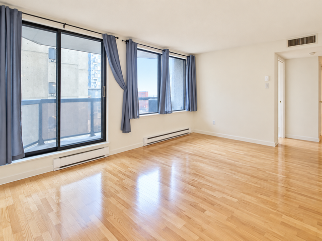 Two-Bedroom Downtown Condo with Hardwood Floors, Patios and Pool