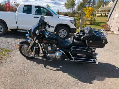 2001 FLHTCI, with rebuilt forks, brakes, tires last year. Cam conversion kit with 525 cams, rebuilt...
