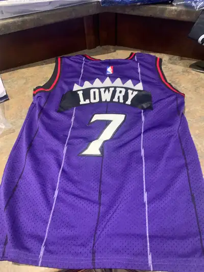 Selling an Adidas Kyle Lowry Toronto Raptors Hardwood Classics jersey in size youth medium. This pur...