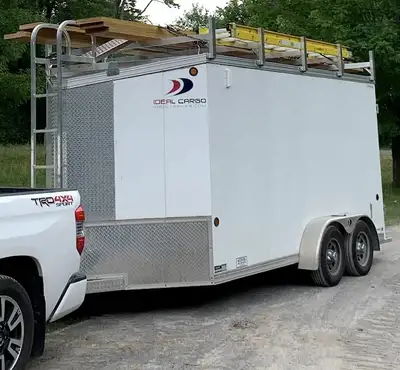 2018 7’x14’ White cargo trailer. 100% Galvanized frame and structure. Upgraded double axle from 5200...