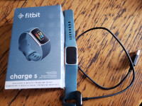 Fitbit Charge 5 in perfect condition.