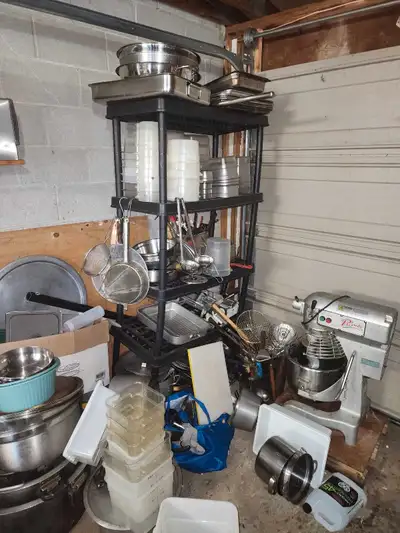 A lot of equipment. Everything 2500$. Includes pizza prep table, gas fryer, dough mixer, pots, pans,...