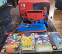 Nintendo switch with 5 games and extra controller, Mario edition
