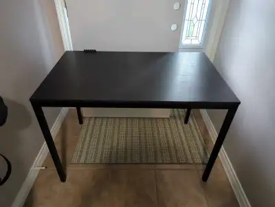 This Ikea Black/Dark table is in great shape. It's perfect for a student or kids playroom or small k...