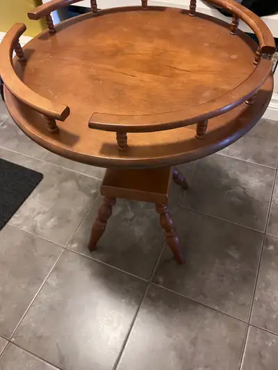19”dia. X23.5”h sold wood end table