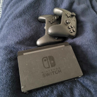 Nintendo Switch and 2 wireless controllers