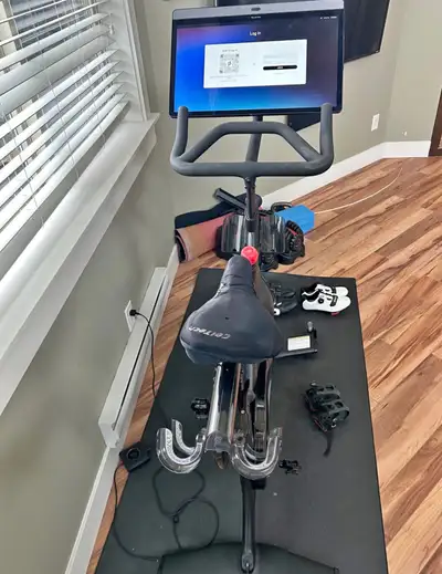 Peloton Bike with shoes and accessories, View more