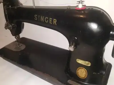 Singer Sewing Machine(31K15), industrial. It is in perfect working condition. It is a vintage Singer...