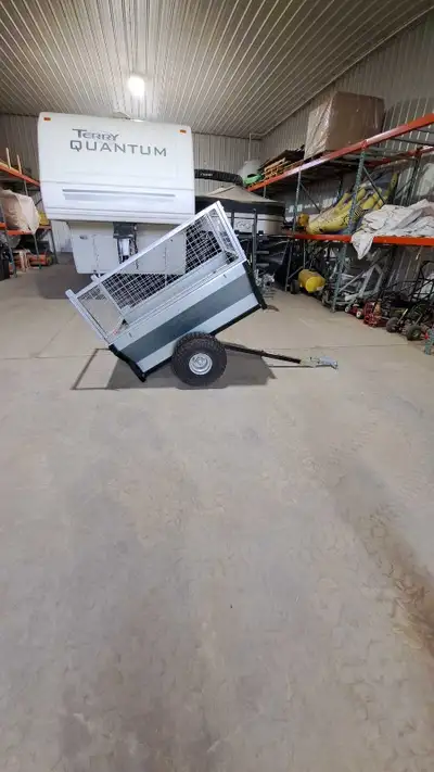 Quad trailer. Dump trailer Ball hitch on it but can easily be switched to any other hitch. Cage exte...