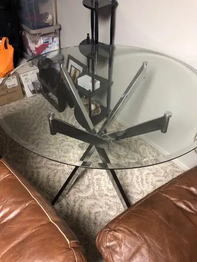 Perfect condition round glass dining table.